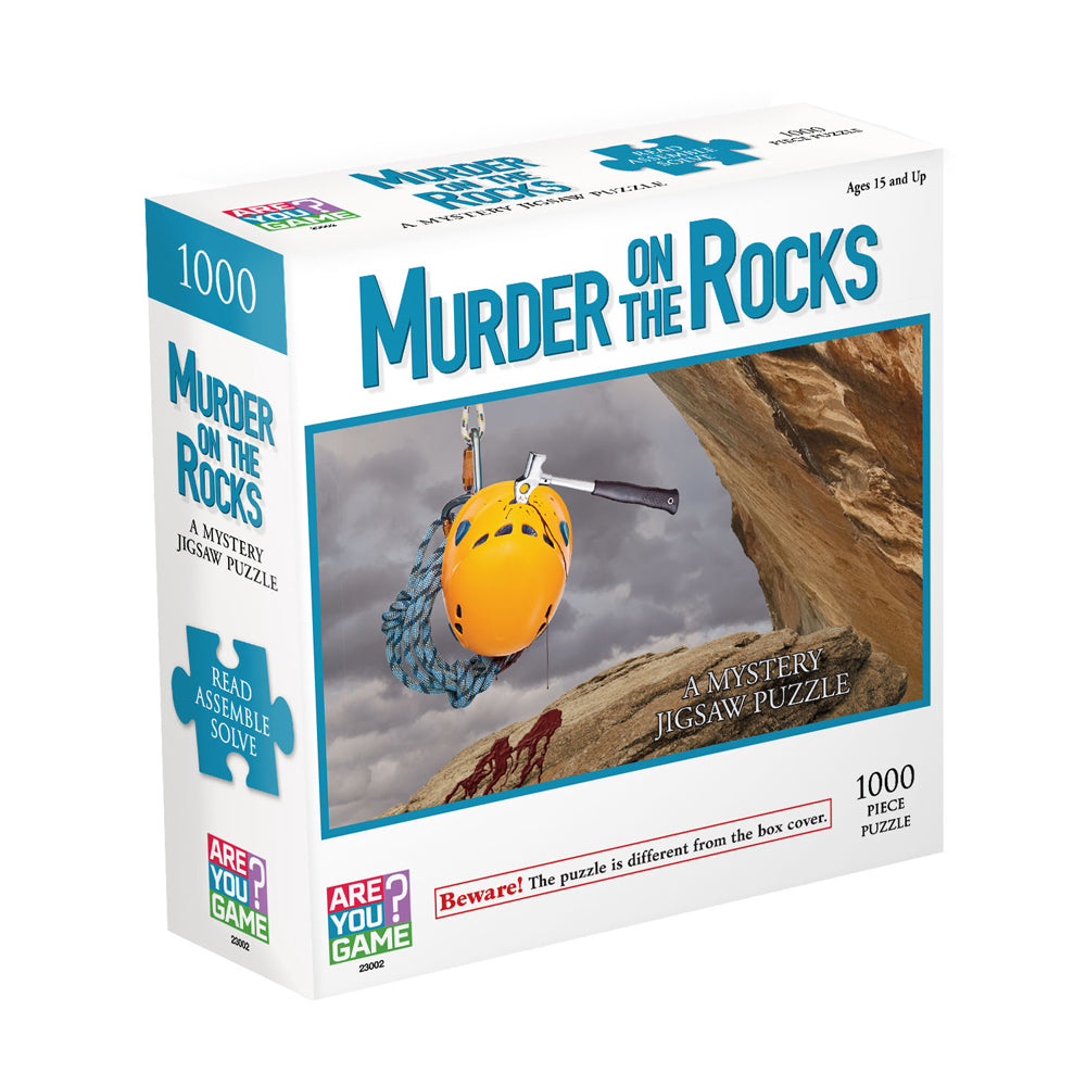 Murder on the Rocks 1000-piece mystery jigsaw puzzle box showing climbing gear on a rocky cliff face