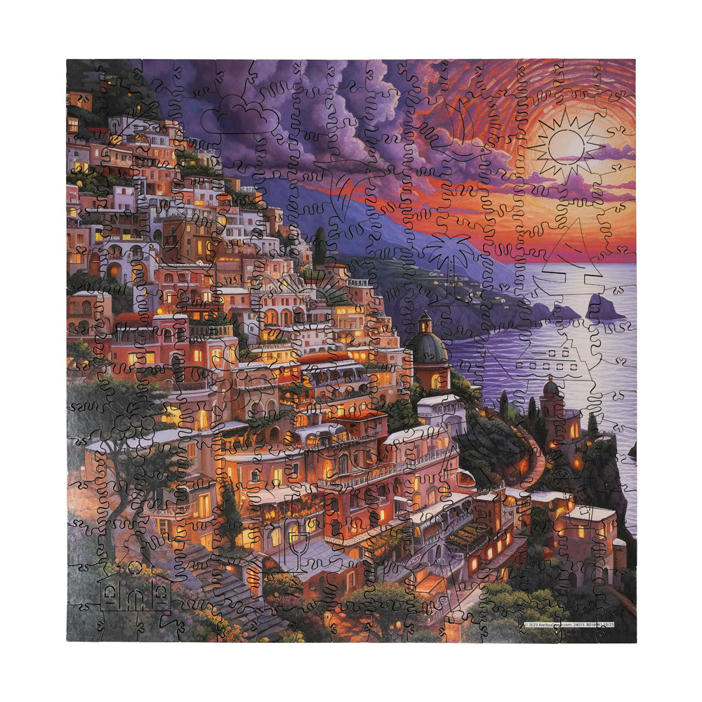 Ocean View Sunset wooden jigsaw puzzle with 237 pieces showing an illuminated coastal village at sunset with purple and orange sky