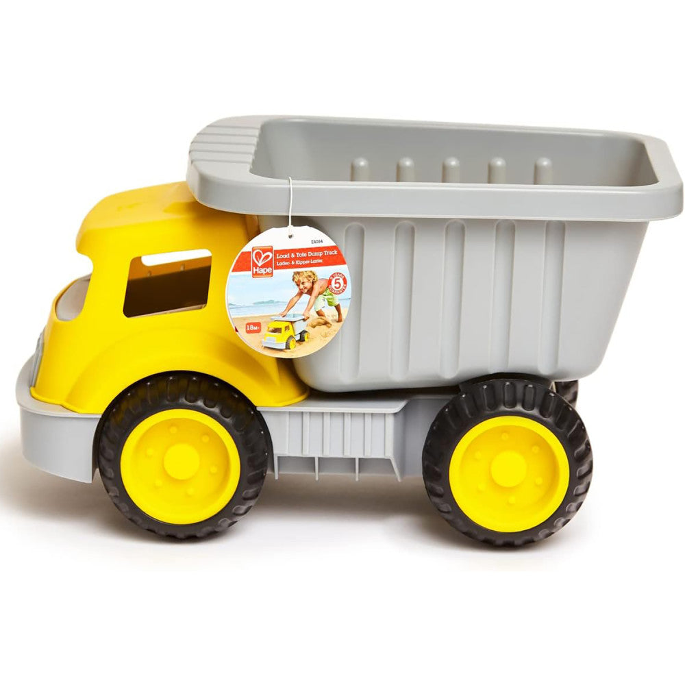 Hape Load & Tote Dump Truck yellow and white sand toy with black wheels