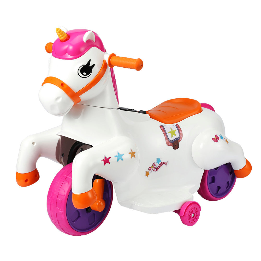 White ride-on unicorn toy with pink and magenta mane, horn, and wheels, orange accents, and colorful stars on body