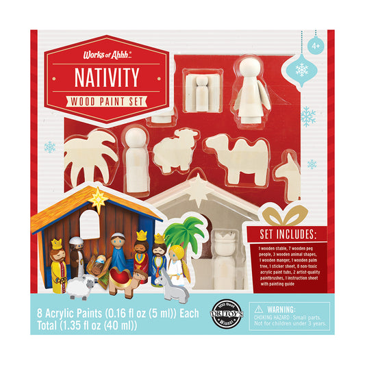 Works of Ahhh Nativity Wood Paint Set package showing unpainted wooden figures, animals, stable, and manger scene pieces with 8 acrylic paint tubes included