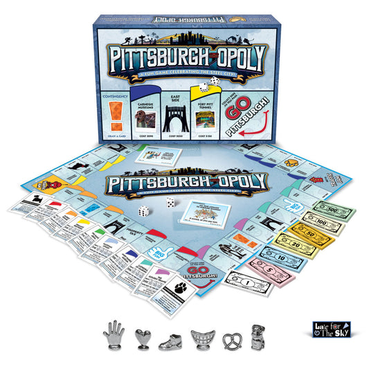 Pittsburgh-Opoly board game box and contents displayed, including game board, property cards, colorful money, dice, and metal game pieces themed around Pittsbur
