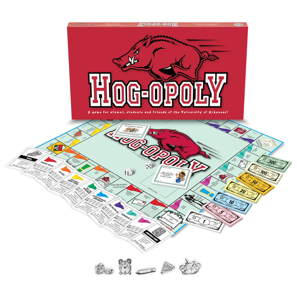 Hog-Opoly board game box and contents displayed, including game board, property cards, colorful play money, dice, and game pieces themed around University of Ar