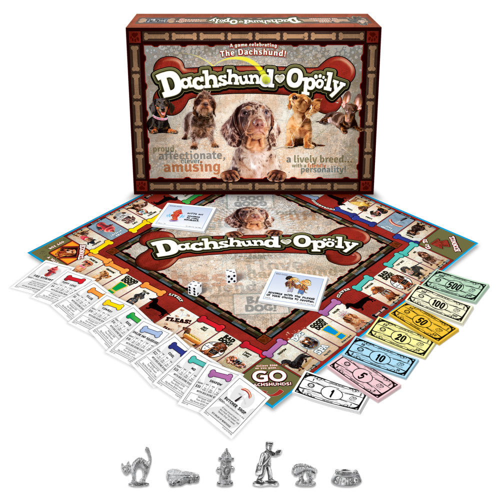 Dachshund-Opoly board game box and contents displayed, including game board, property cards, play money, dice, and metal game pieces shaped like dachshunds and