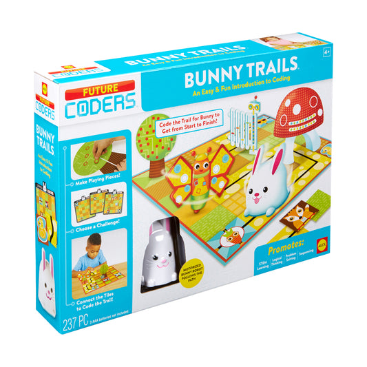 Future Coders Bunny Trails coding game box showing motorized bunny robot, colorful game board with tiles and trails, and product packaging with game pieces