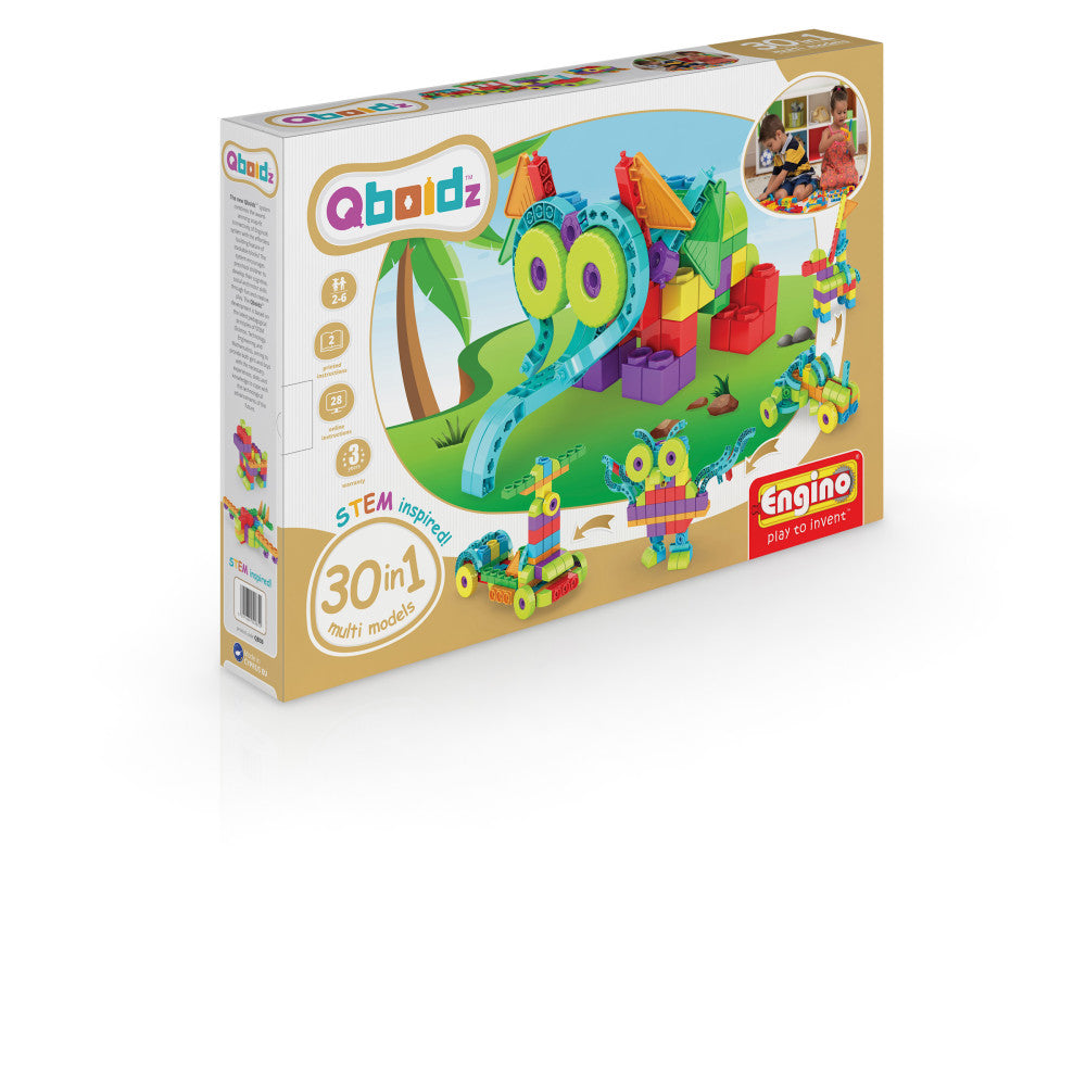 Engino Qboidz 30-in-1 STEM building set box showing colorful interlocking blocks assembled into caterpillar and vehicle models on green landscape