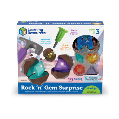 Learning Resources Rock 'n' Gem Surprise set with brown geodes containing colorful gems inside, green tool, and loose gemstones in various shapes and colors for