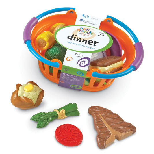 New Sprouts Dinner Basket playset with colorful orange basket, blue handles, and purple accents containing play food including corn, green beans, tomato, and sa