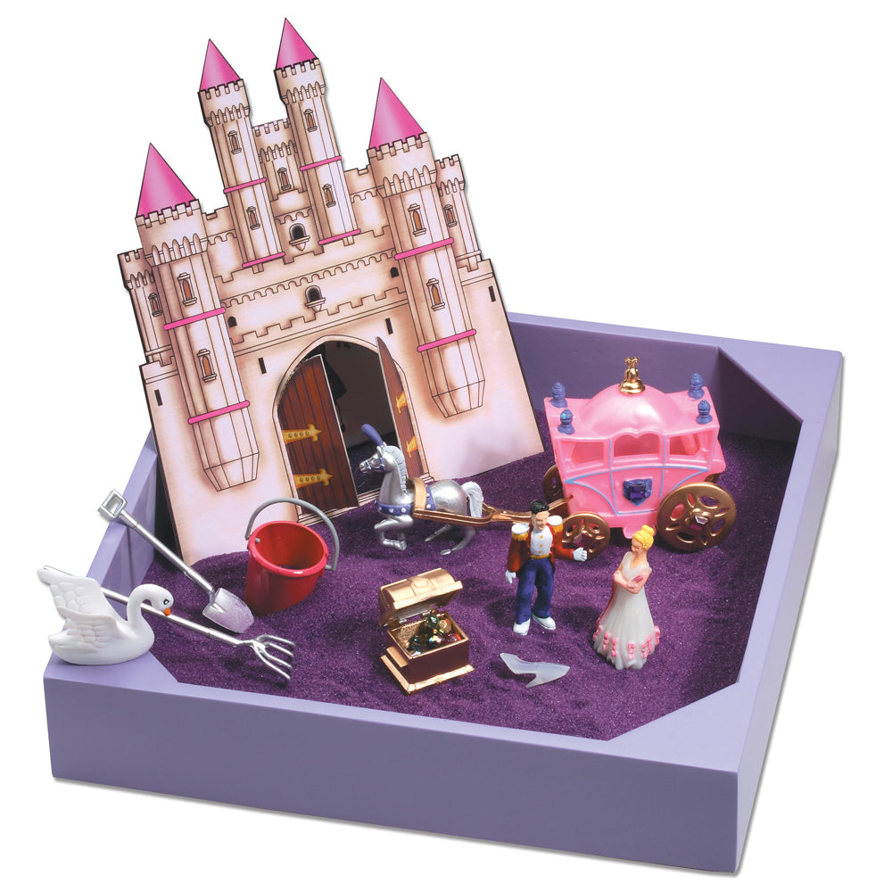 Princess castle playset with purple sand base, pink castle tower, carriage, two child figurines, swan, bucket, and accessories