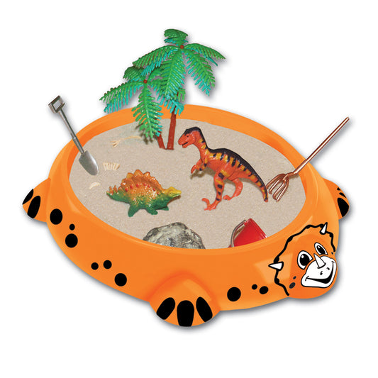 Orange UFO-shaped sandbox play set with black spots and character face, containing sand, green palm tree, red and orange dinosaur figure, green dinosaur, rock,