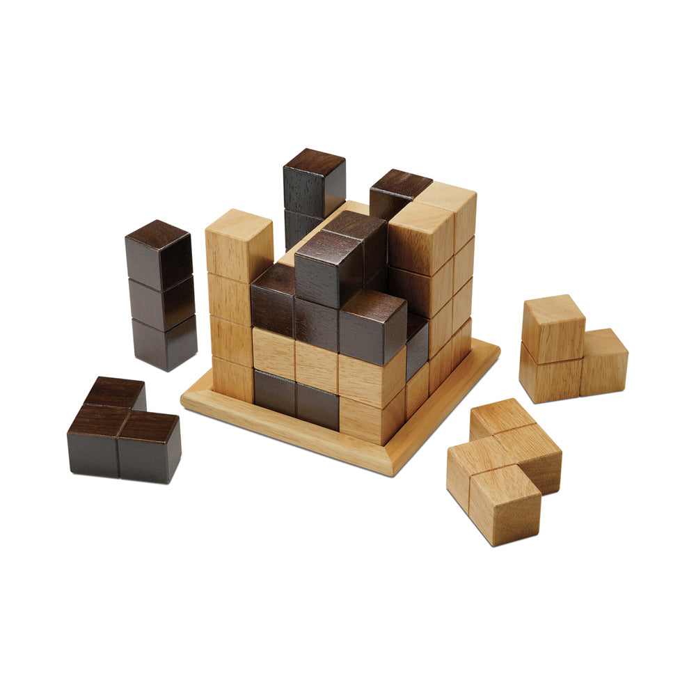 Quadefy Strategy Board Game wooden block puzzle with natural and dark wood cubes on a base board, surrounded by loose pieces