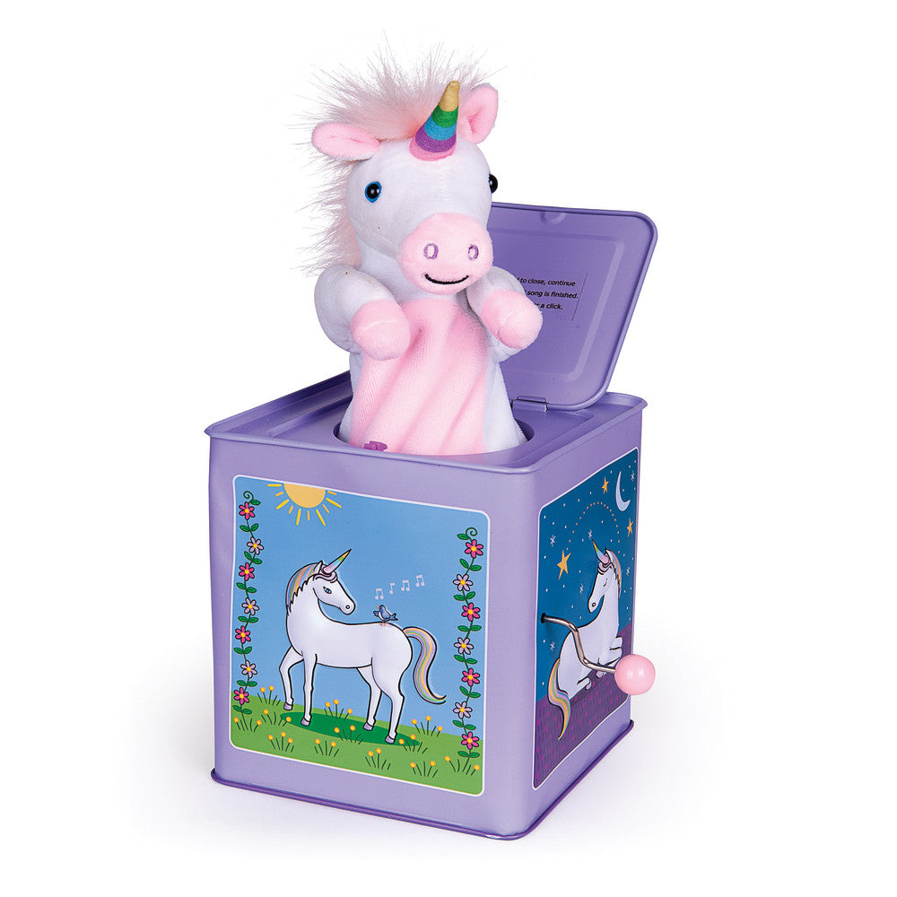Unicorn jack in the box toy with purple box, white unicorn plush with rainbow horn and pink mane, pink baby unicorn plush inside