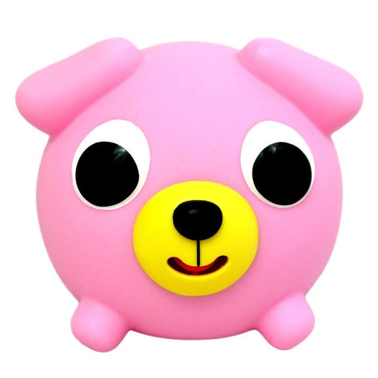 Pink plush squeeze ball with rounded ears, large white eyes with black pupils, and yellow smiling face with black nose