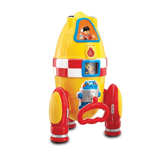 Yellow and red rocket toy with blue accents, featuring a cockpit window with astronaut figure, observation window, robot character, and red thruster legs on pla