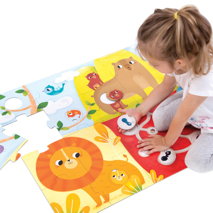 Modeled by a child, colorful floor puzzle featuring animals including a lion, bear, bird, and fish with matching pairs on yellow, blue, and red sections