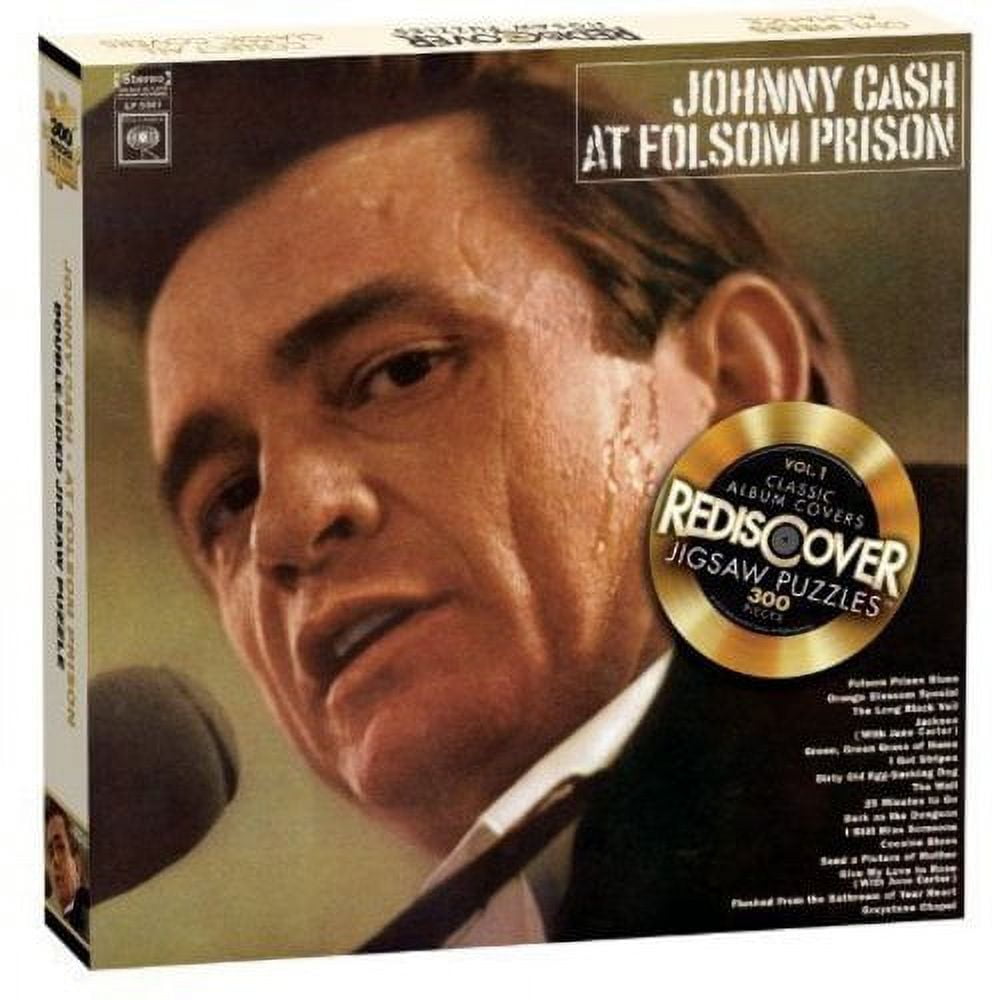 Johnny Cash at Folsom Prison jigsaw puzzle box featuring Cash's portrait with gold record seal and song track listing