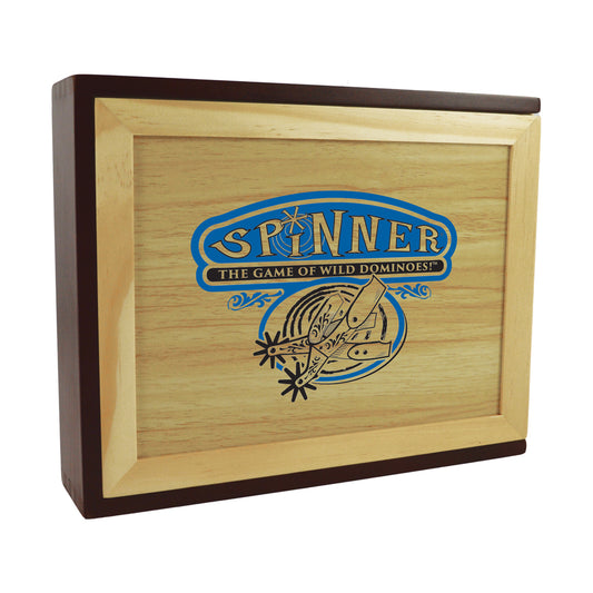 Wooden box with light and dark wood frame containing Spinner Wild Dominoes game, featuring blue and gold logo and domino illustration on lid