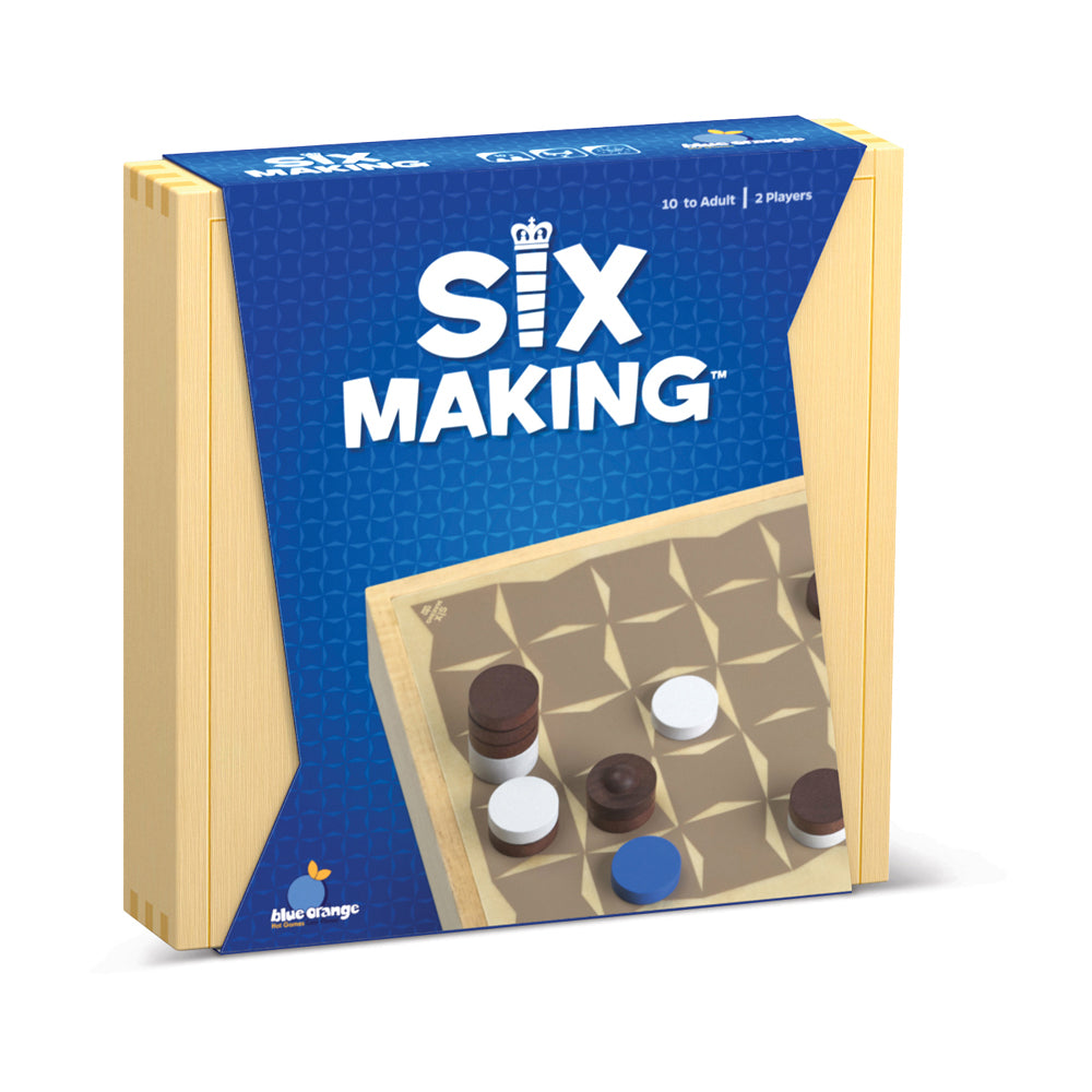 Six Making board game box with blue label and wooden game board showing brown, white, and blue game pieces arranged on a grid