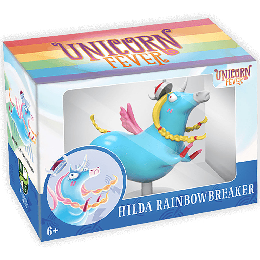 Unicorn Fever Hilda Rainbowbreaker figure in packaging, blue unicorn with pink wings, yellow mane and gold accents, shown in box with rainbow gradient design