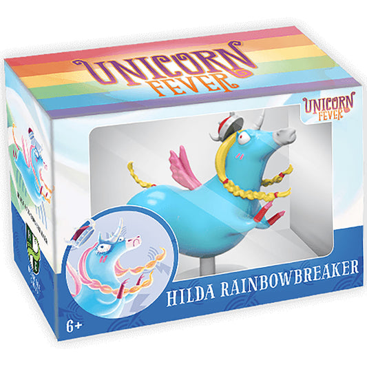Unicorn Fever Hilda Rainbowbreaker figure in packaging, blue unicorn with pink wings, yellow mane and gold accents, shown in box with rainbow gradient design
