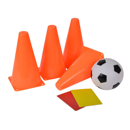 Orange training cones, soccer ball with black and white panels, and red and yellow referee cards on plain background