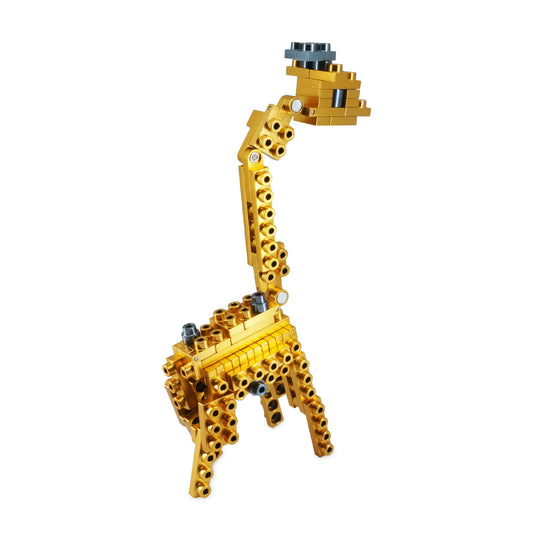 Gold and charcoal black building block giraffe model with articulated legs and long neck on plain background