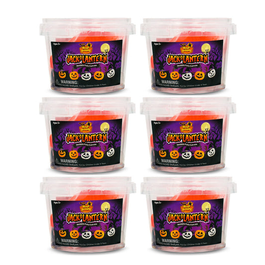 Six Build Buddiez Jack-O-Lantern Craft Kits arranged in a grid, each clear container filled with pink putty and featuring Halloween-themed label with pumpkin fa