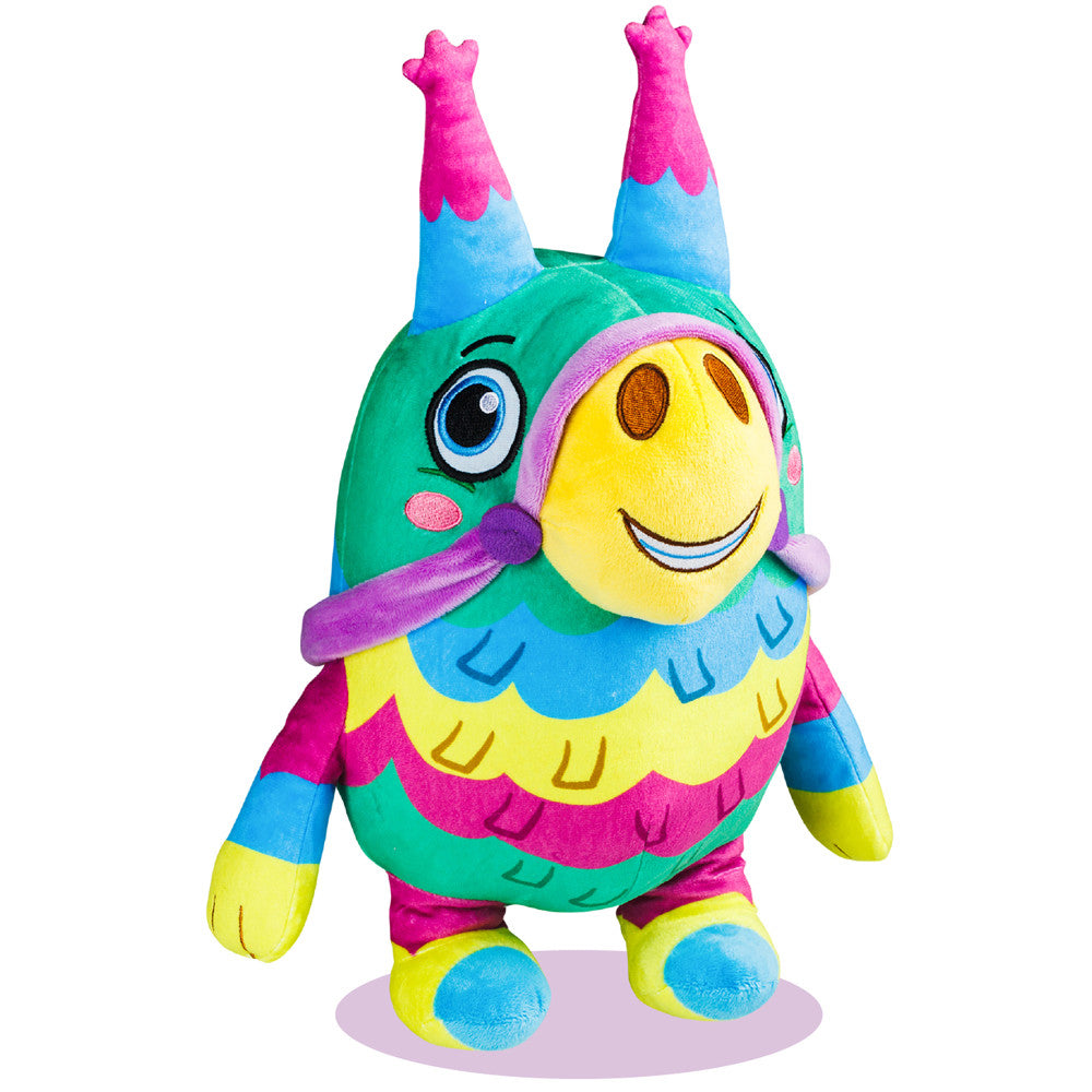 Colorful plush creature with green body, pink horns, yellow smiling face, purple arm, and multicolored striped limbs in blue, pink, and yellow