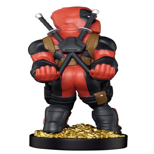 Deadpool action figure collectible holding crossed swords, red and black costume with brown accents, standing on gold base