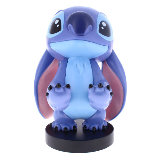 Blue and purple plush Stitch character figure with large eyes, wide smile, and pink inner ears, mounted on a black base