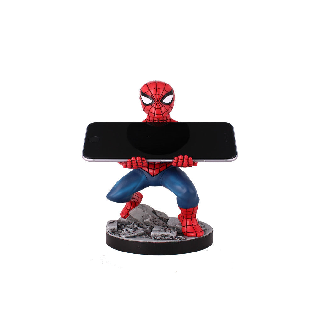 Spider-Man figure in red and blue suit holding a smartphone on a gray rocky base