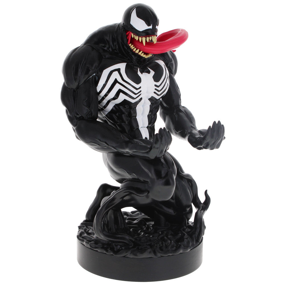 Black Venom action figure with white spider symbol on chest, red tongue extended, posed on black base