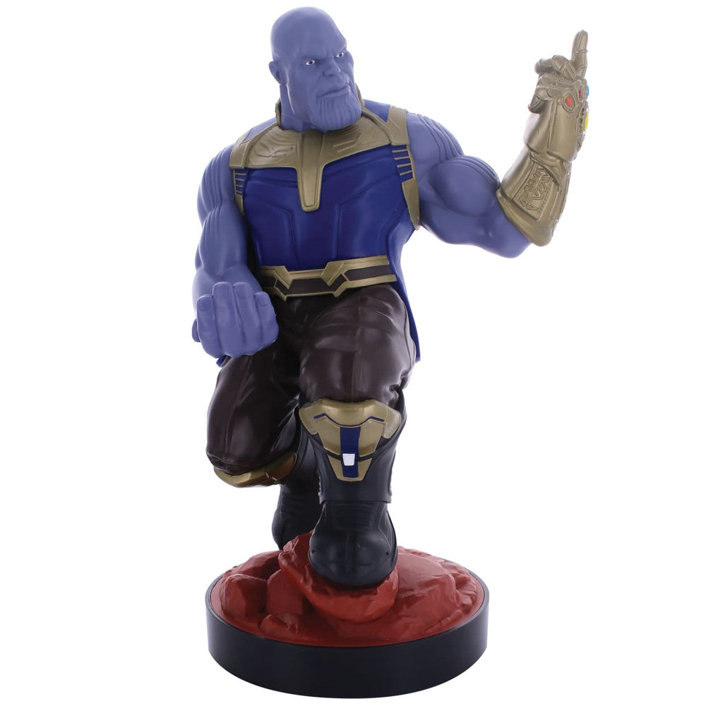Thanos action figure with blue skin, gold and blue armor, holding gauntlet aloft on red and black base