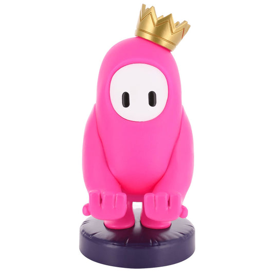 Pink plush character with white face and black eyes wearing gold crown, standing on dark purple base