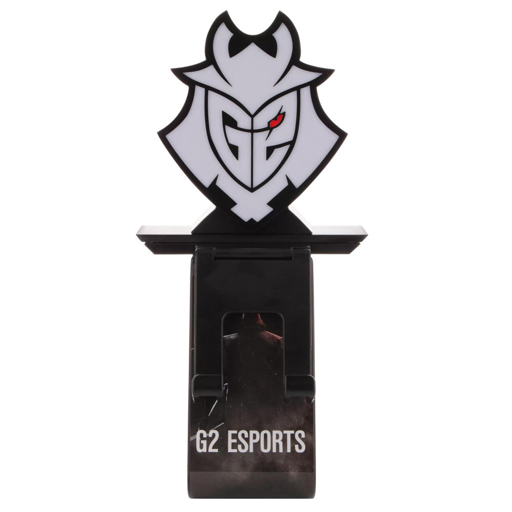 Gray and black samurai-style character bust with red eyes mounted on black base labeled G2 Esports, serving as a phone charging stand