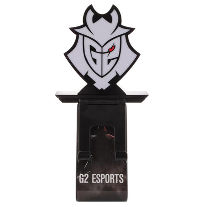 Gray and black samurai-style character bust with red eyes mounted on black base labeled G2 Esports, serving as a phone charging stand