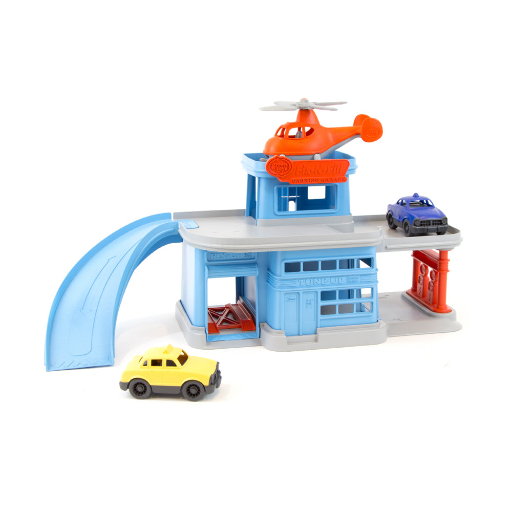 Blue and white multi-level parking garage playset with orange helicopter on roof, curved ramp, and three included toy vehicles: yellow car, blue car, and red ca