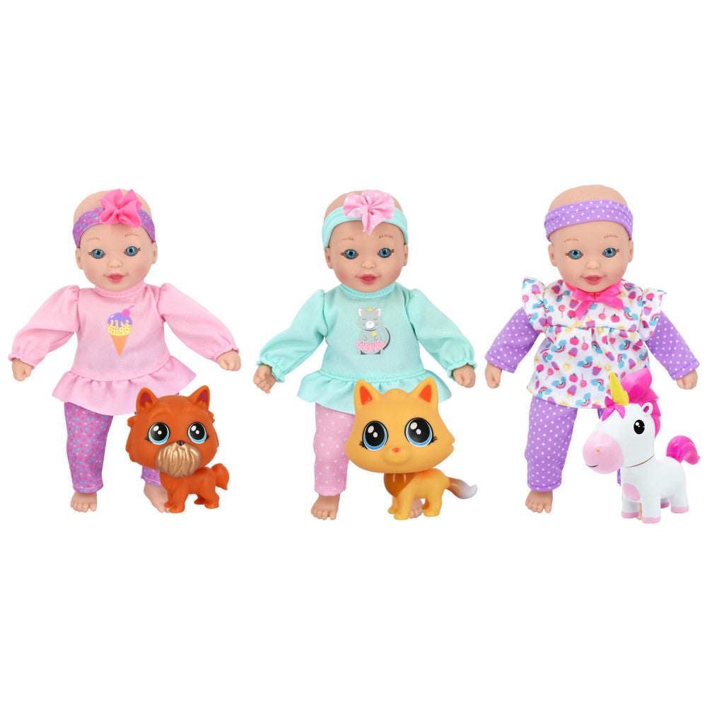 Three small baby dolls with headbands and colorful outfits paired with animal companions: pink outfit with orange cat, turquoise outfit with yellow cat, purple
