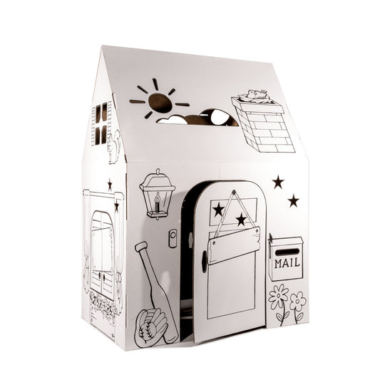 White cardboard playhouse with black line-drawn details including a door, mailbox, window, lantern, stars, sun, and flowers; open entrance shown on plain backgr