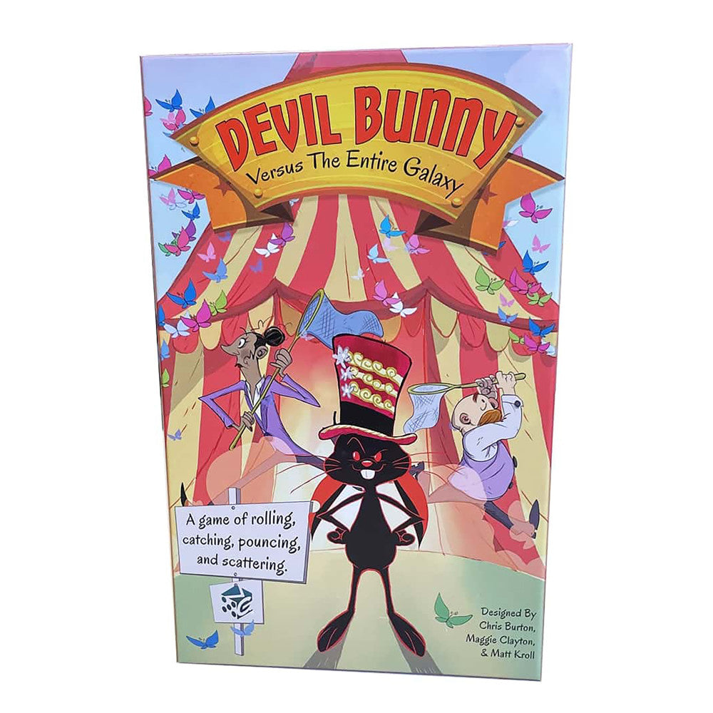 Devil Bunny Versus The Entire Galaxy board game box featuring a black bunny character in a top hat at a colorful carnival tent with butterflies