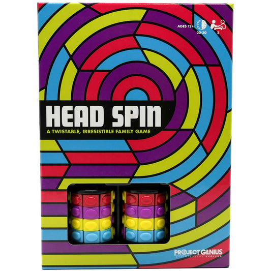 Head Spin board game box showing colorful concentric circles in red, purple, yellow, and blue with two stacked fidget spinner puzzles displayed in window below