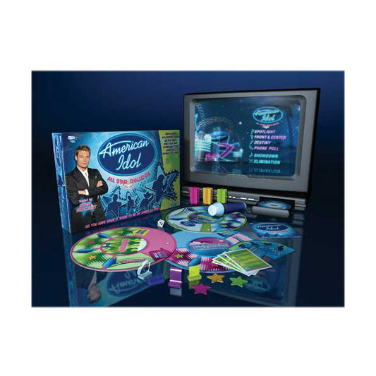 American Idol All Star Challenge DVD Trivia Game displayed with game board, cards, colored pieces, microphone, and TV monitor showing gameplay screen