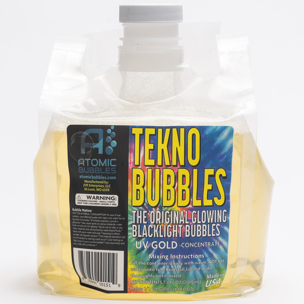 Tekno Bubbles UV Gold concentrate bubble solution in clear pouch with gray cap, labeled 'The Original Glowing Blacklight Bubbles'