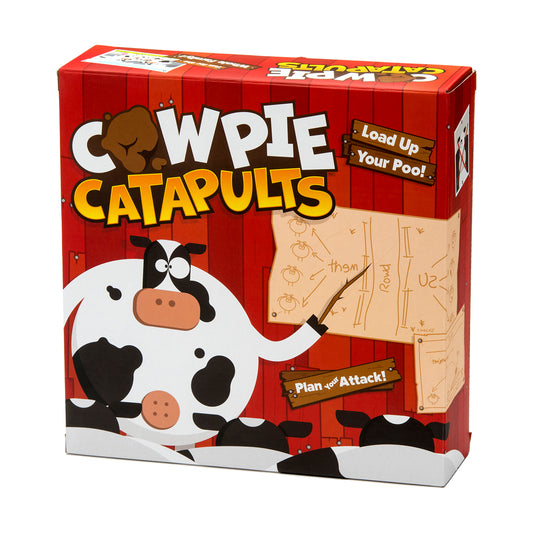Cow Pie Catapults game box with red barn-style design, cartoon cow character, catapult game pieces, and wooden game board showing farm layout