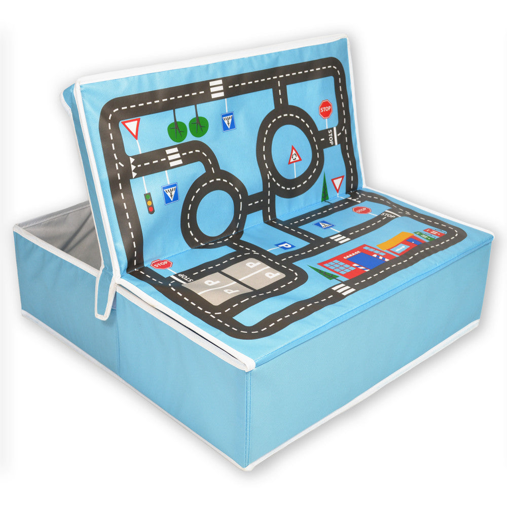 Blue pop-up play mat with black road design, traffic signs, and circular tracks for toy cars, attached to storage box base
