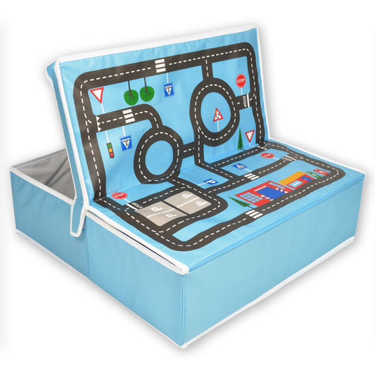 Blue pop-up play mat with black road design, traffic signs, and circular tracks for toy cars, attached to storage box base