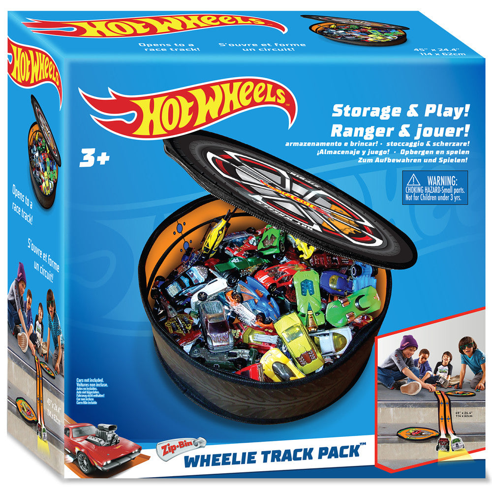 Hot Wheels Zip Bin Wheelie Track Pack storage case opened to show colorful die-cast cars inside, with black tire-shaped carrying case and race track lid, modele