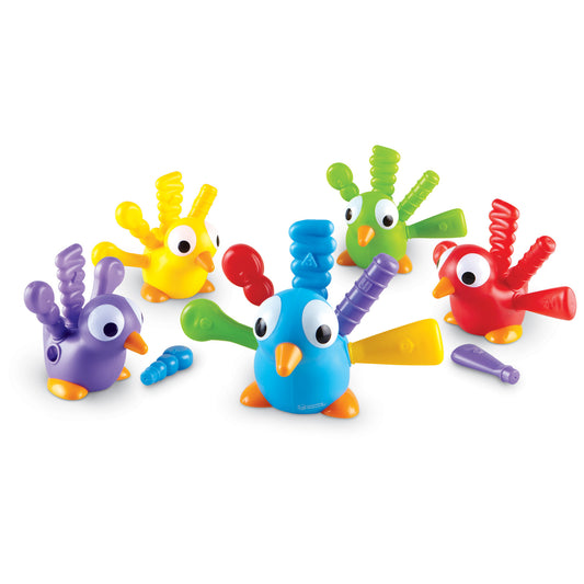 Five colorful bird figurines with large googly eyes and textured feather attachments in purple, yellow, blue, green, and red