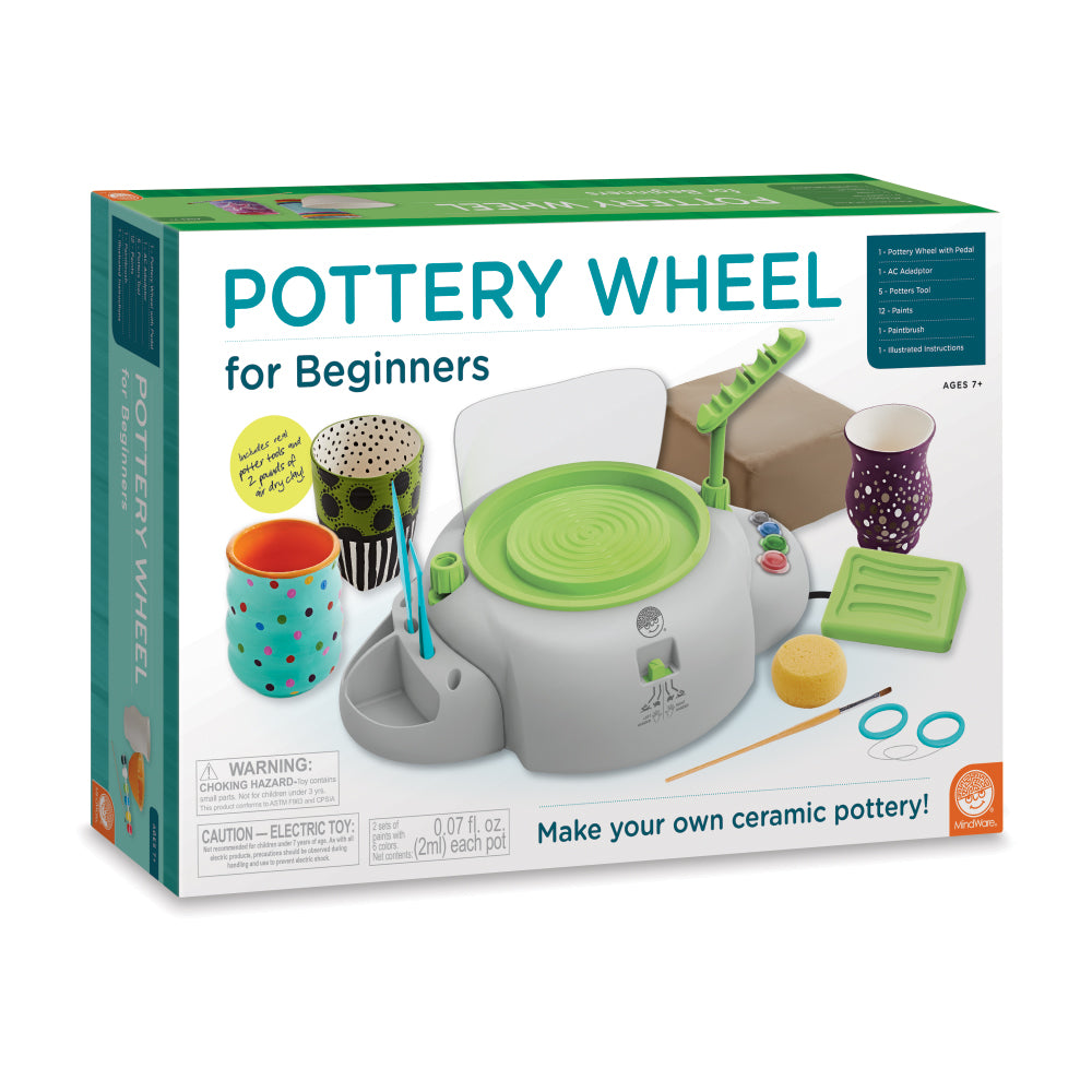 Pottery Wheel for Beginners kit box showing white electric wheel with green trim, clay tools, and example ceramic pots painted with colorful designs