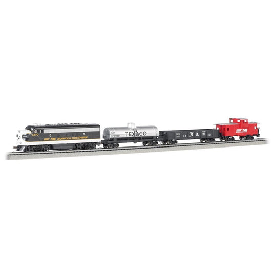 Bachmann Trains N scale model train set with black and gold Norfolk Southern locomotive, white Texaco tanker car, black N&W freight car, and red caboose on whit